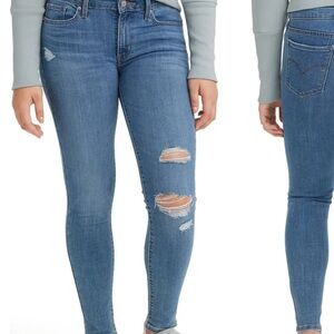 711 Distressed Skinny Jeans